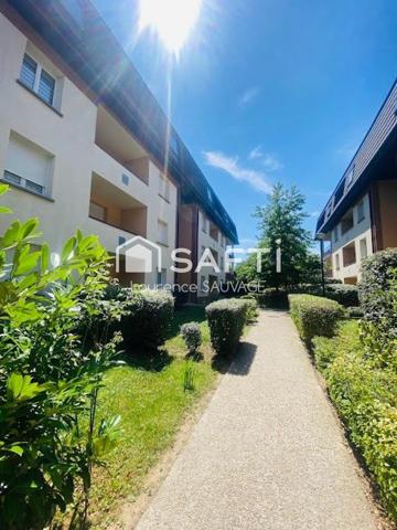 Appartement T2 en rez de jardin avec place de parking