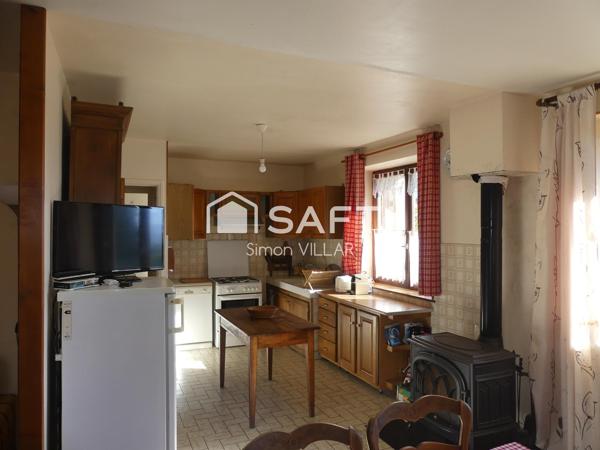 Maison spacieuse avec potentiel et grand terrain