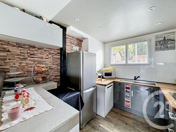 Appartement à vendre  4 pièces - 61 m 2   FEYZIN  - 69