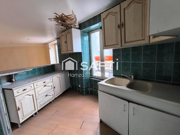 Immeuble de rapport en centre ville 2 appartements et un commerce