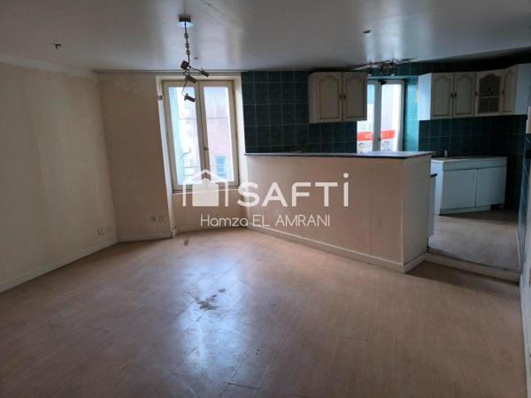 Immeuble de rapport en centre ville 2 appartements et un commerce