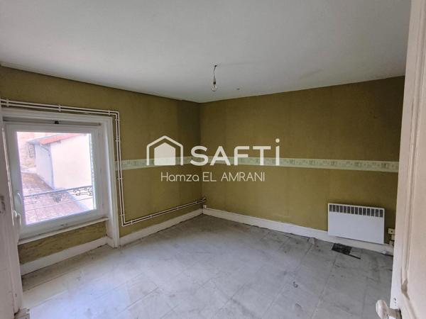 Immeuble de rapport en centre ville 2 appartements et un commerce