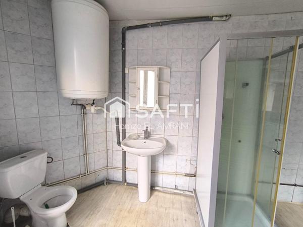 Immeuble de rapport en centre ville 2 appartements et un commerce