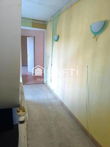 Immeuble de rapport en centre ville 2 appartements et un commerce