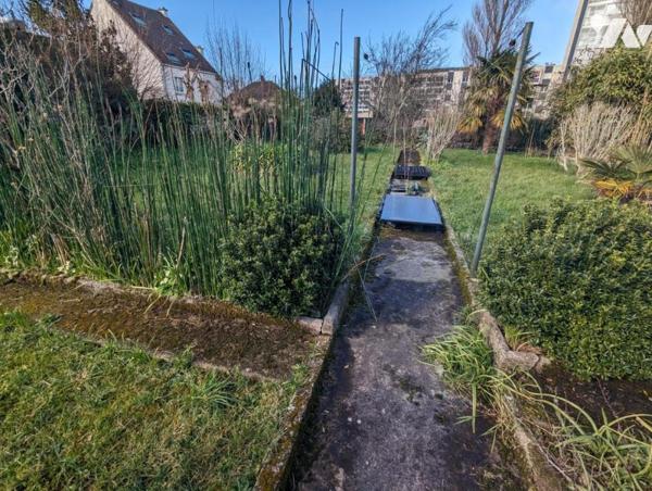 TOURLAVILLE - MAISON AVEC TERRAIN A BATIR