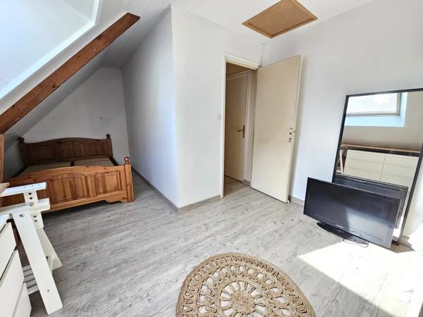 Maison 4 chambres + un garage idéalement située