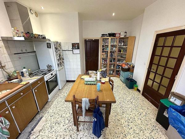 Maison de village avec garage et jardin