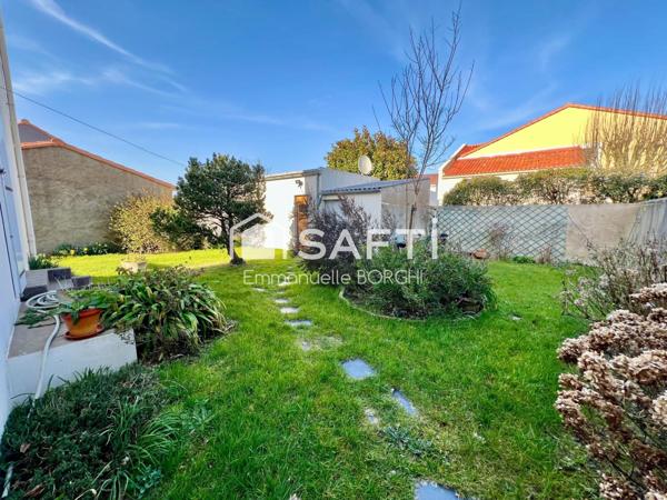 Maison 3 chambres - grand garage - jardin