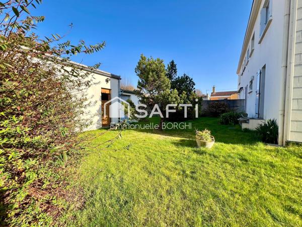 Maison 3 chambres - grand garage - jardin