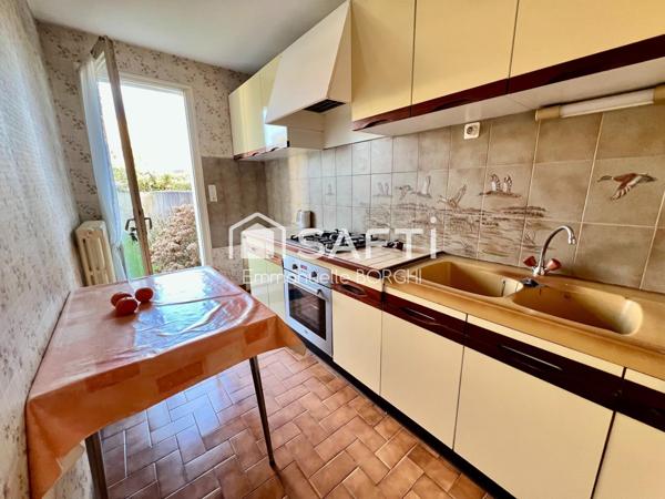 Maison 3 chambres - grand garage - jardin