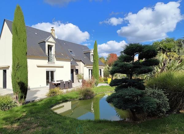 Belles prestations : Maison 5 chambres, garage, piscine, jardin paysagé