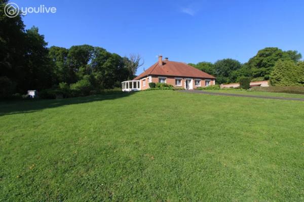 Propriété sur un terrain de 12888 m² comprenant 2 habitations (185m² et 75 m²)