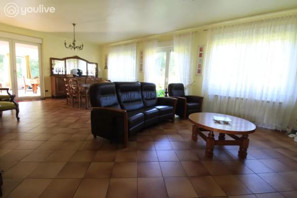 Propriété sur un terrain de 12888 m² comprenant 2 habitations (185m² et 75 m²)