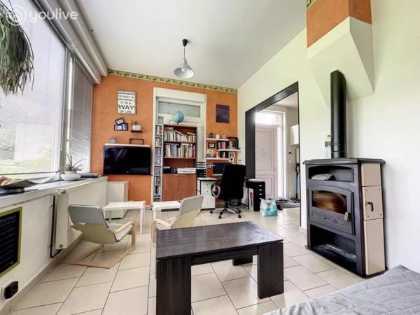 Propriété sur un terrain de 12888 m² comprenant 2 habitations (185m² et 75 m²)