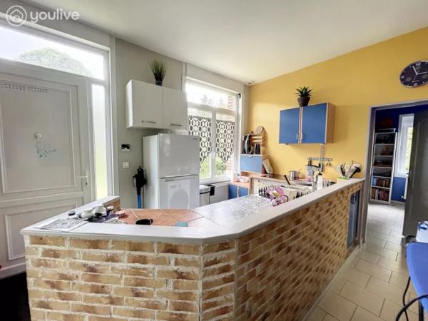 Propriété sur un terrain de 12888 m² comprenant 2 habitations (185m² et 75 m²)