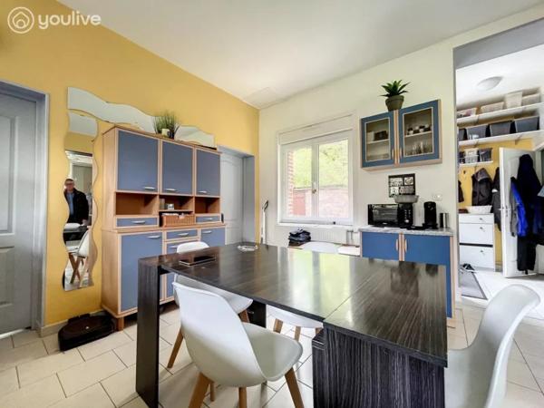 Propriété sur un terrain de 12888 m² comprenant 2 habitations (185m² et 75 m²)