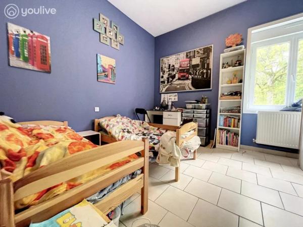 Propriété sur un terrain de 12888 m² comprenant 2 habitations (185m² et 75 m²)