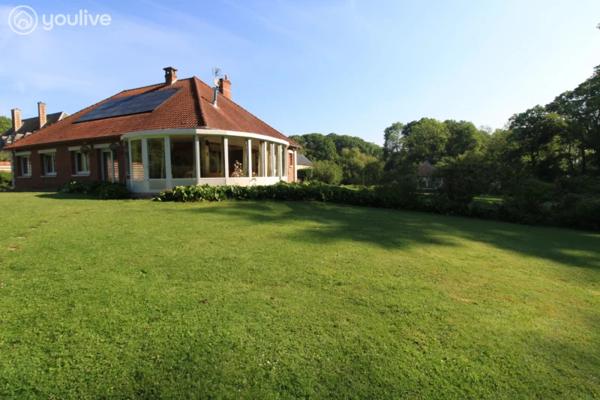 Propriété sur un terrain de 12888 m² comprenant 2 habitations (185m² et 75 m²)