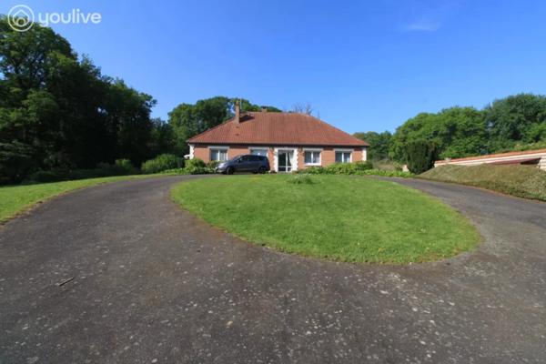 Propriété sur un terrain de 12888 m² comprenant 2 habitations (185m² et 75 m²)