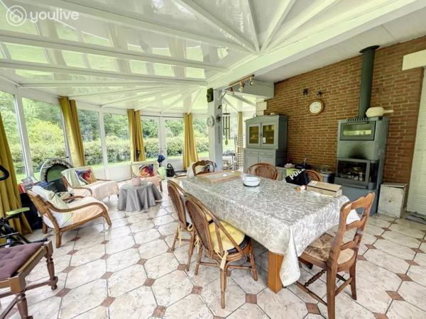 Propriété sur un terrain de 12888 m² comprenant 2 habitations (185m² et 75 m²)