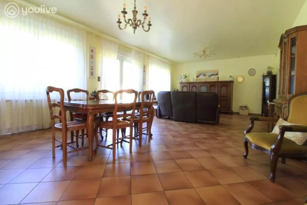 Propriété sur un terrain de 12888 m² comprenant 2 habitations (185m² et 75 m²)