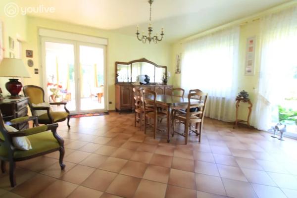 Propriété sur un terrain de 12888 m² comprenant 2 habitations (185m² et 75 m²)