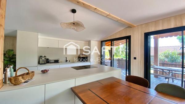 Maison ossature bois rénovée avec sa belle extension à peine terminée offre un cadre de vie chaleureux