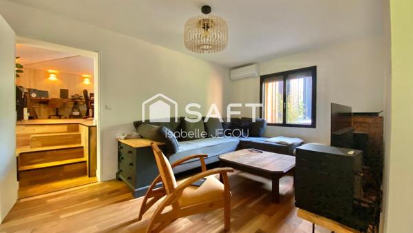 Maison ossature bois rénovée avec sa belle extension à peine terminée offre un cadre de vie chaleureux