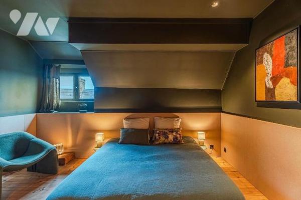 Située dans un charmant village authentique composé de plusieurs maisons en pierre, cette propr...