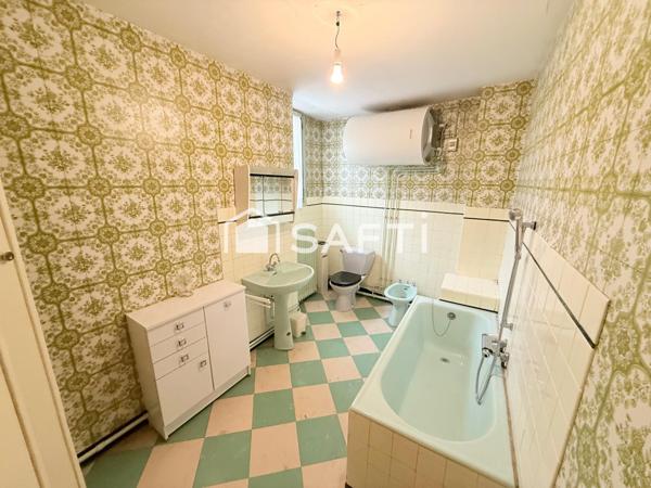 Maison d'habitation 4 pièces avec jardin et véranda