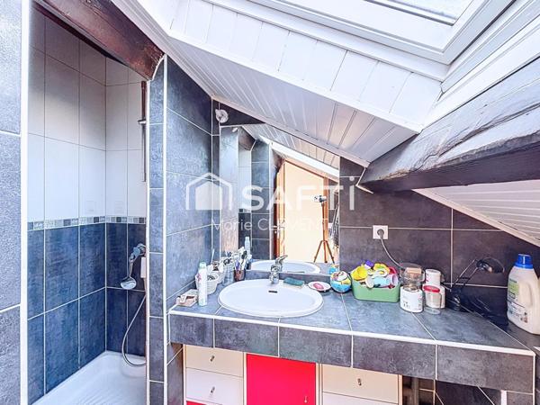 Appartement de 113 m2 avec 2 chambres, jardin, place de parking