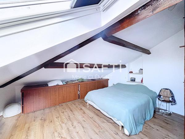 Appartement de 113 m2 avec 2 chambres, jardin, place de parking