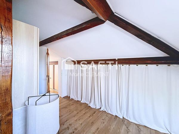 Appartement de 113 m2 avec 2 chambres, jardin, place de parking