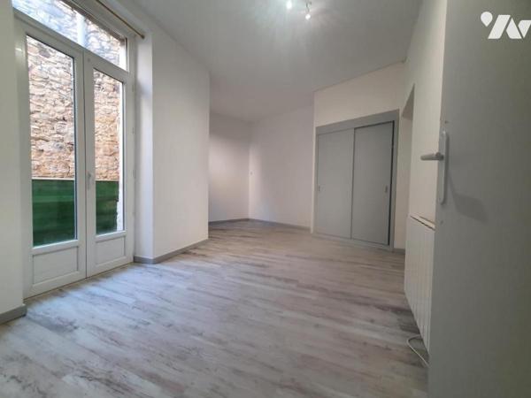 Bel immeuble de rapport dans village de caractère 