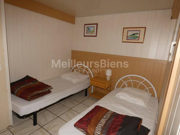 appartement T5 / 4 chambres de 81m2 avec jardin privatif en centre ville du Mont dore