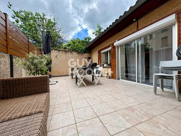 Appartement esprit loft T4 avec terrasse et garage double - coeur de ville