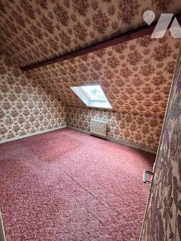 Maison familiale avec jardin – 4 chambres – Beau potentiel
