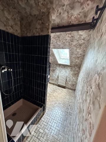 Maison familiale avec jardin – 4 chambres – Beau potentiel