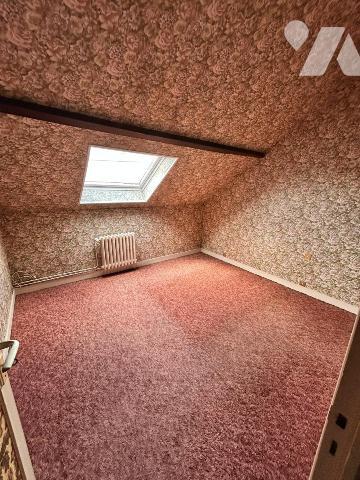 Maison familiale avec jardin – 4 chambres – Beau potentiel