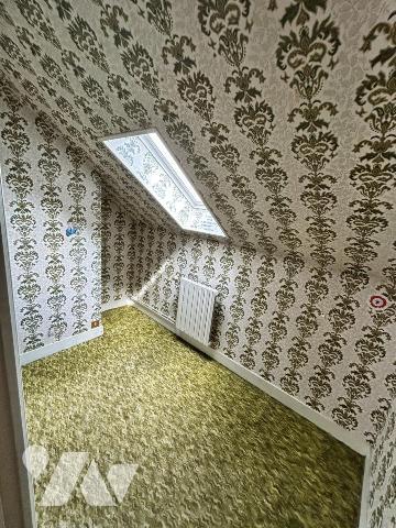 Maison familiale avec jardin – 4 chambres – Beau potentiel