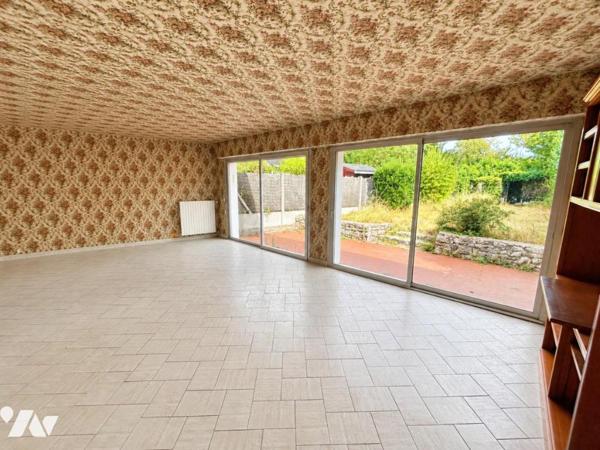 Maison familiale avec jardin – 4 chambres – Beau potentiel