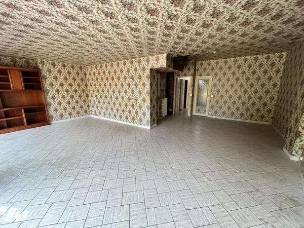 Maison familiale avec jardin – 4 chambres – Beau potentiel