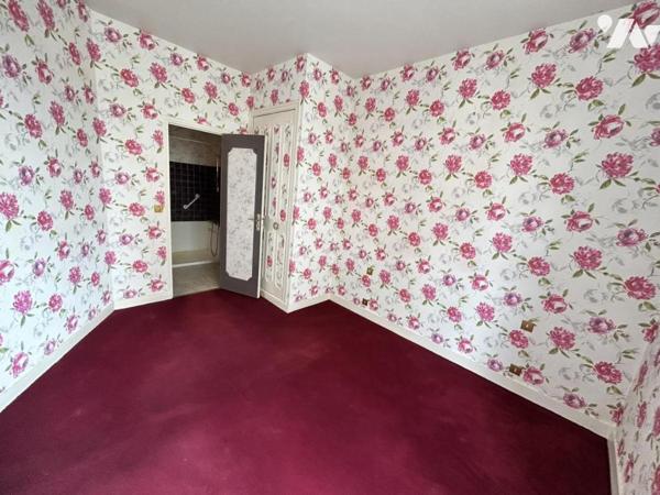Maison familiale avec jardin – 4 chambres – Beau potentiel