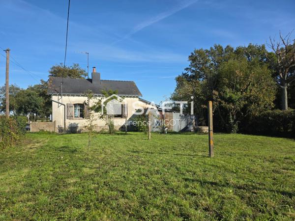 Maison de garde-barrière à rénover