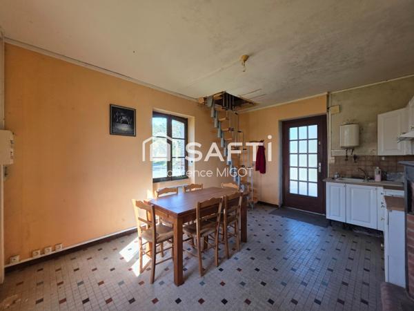 Maison de garde-barrière à rénover