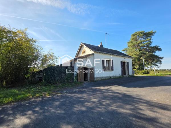 Maison de garde-barrière à rénover