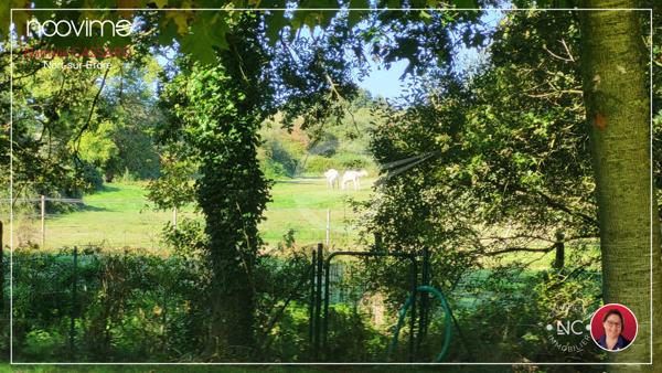 Maison de Plain-pied de 2006 - 4 chambres - double garage en village près du Canal