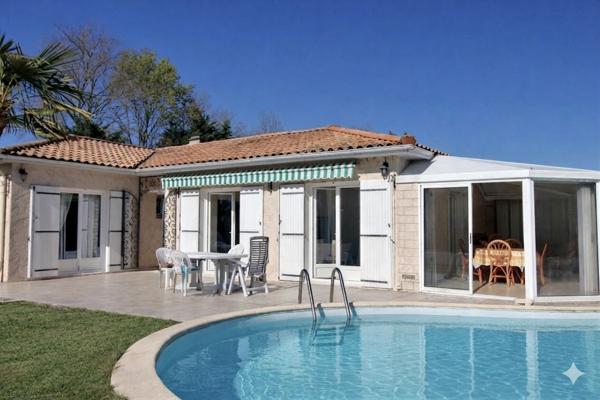 Maison plain-pied 113 m² – DPE performant – piscine – terrain 830 m² 395 000 €