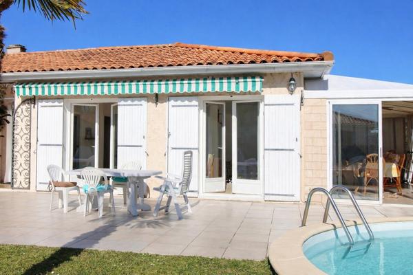 Maison plain-pied 113 m² – DPE performant – piscine – terrain 830 m² 395 000 €