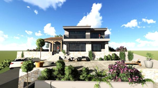 Terrain avec permis de construire à Brando : Une rareté à saisir